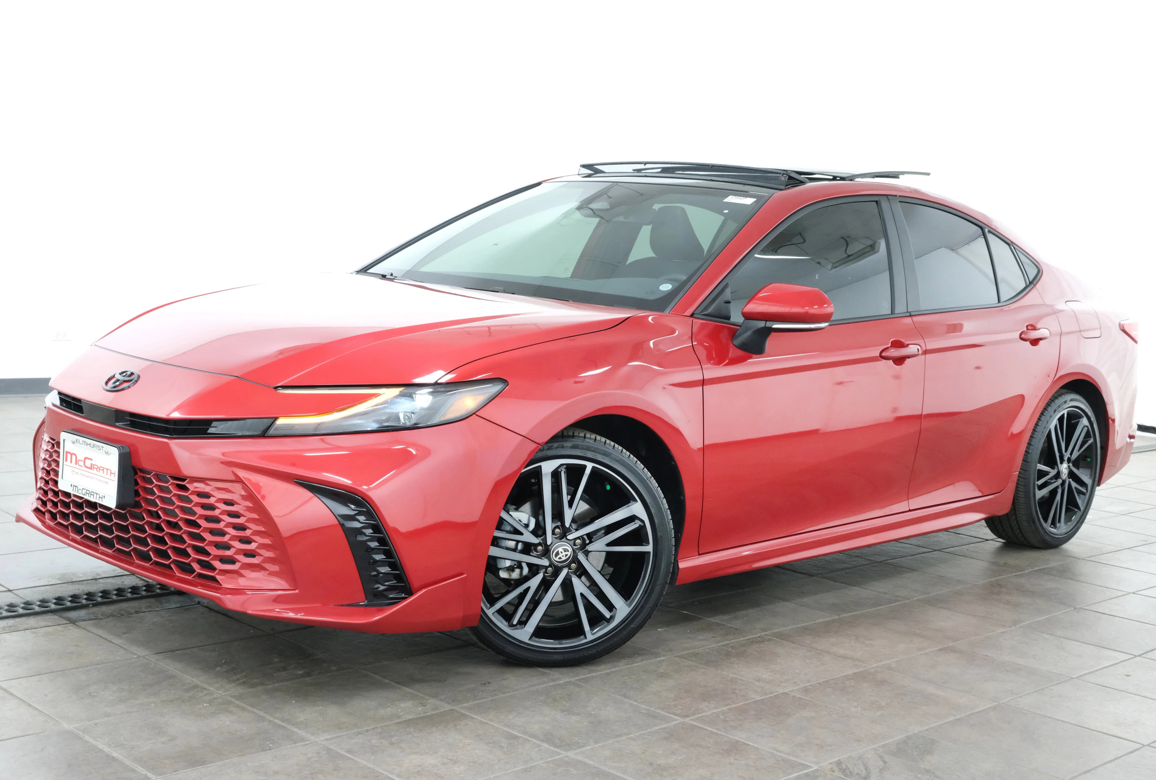 2025 Toyota Camry XSE · Supersonic Red exterior